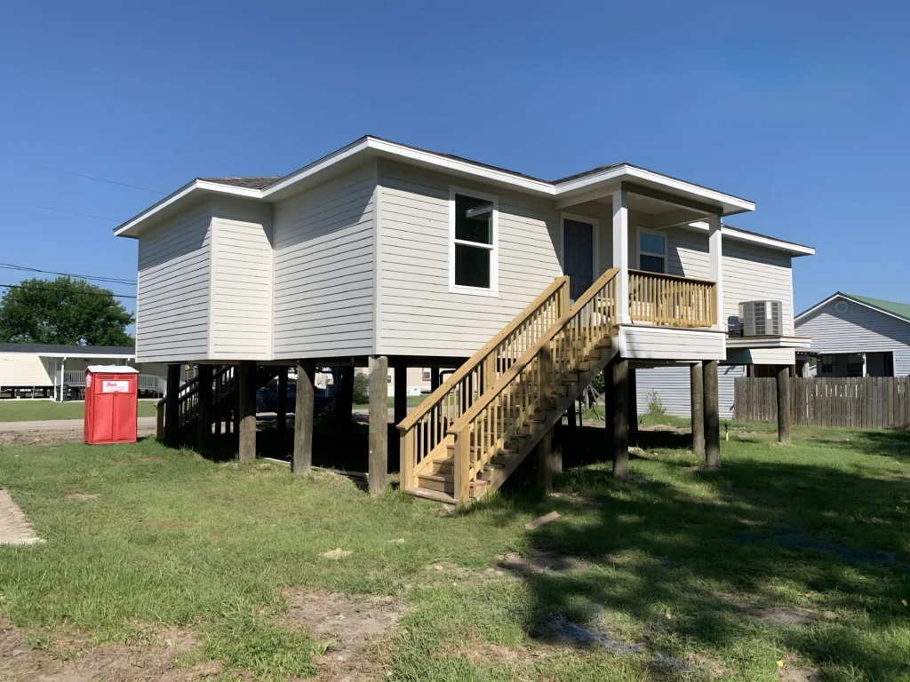 Elevated House Exterior Side View Stairs Siding